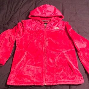 Pink fuzzy north face jacket